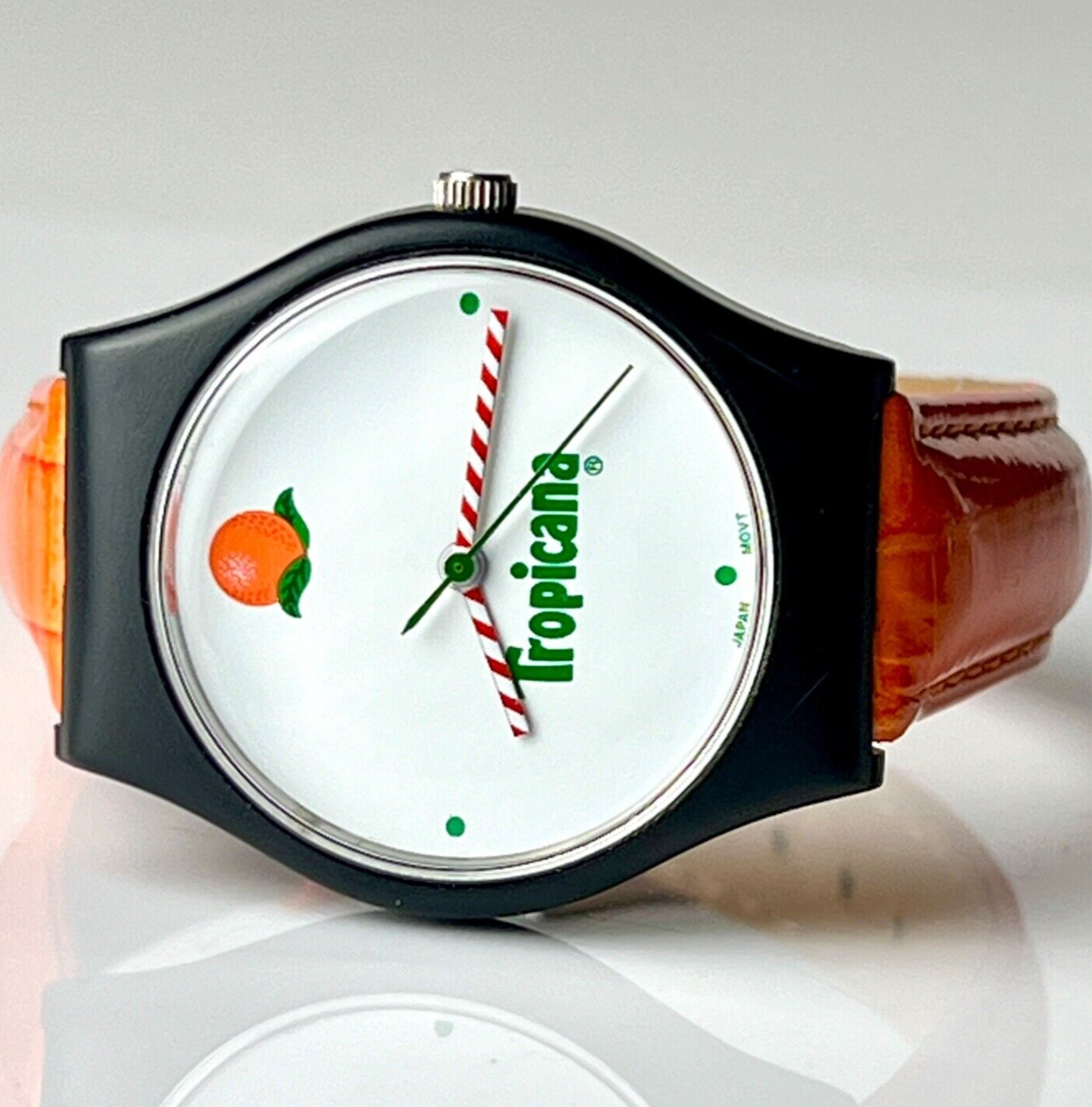 Invicta X Tropicana Vintage Watch The Juice is Loose Black 35mm Case Orange Leather Bands