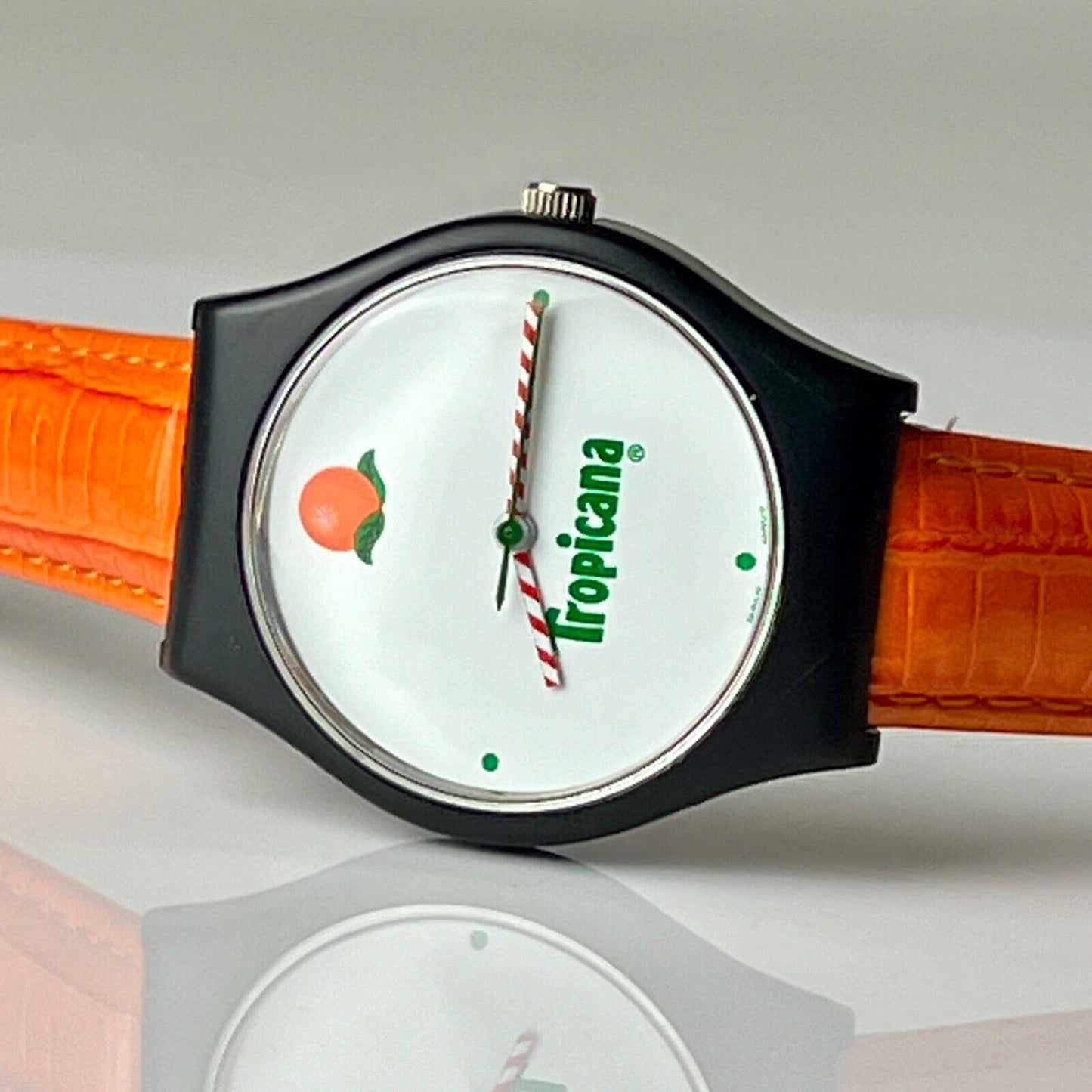 Invicta X Tropicana Vintage Watch The Juice is Loose Black 35mm Case Orange Leather Bands