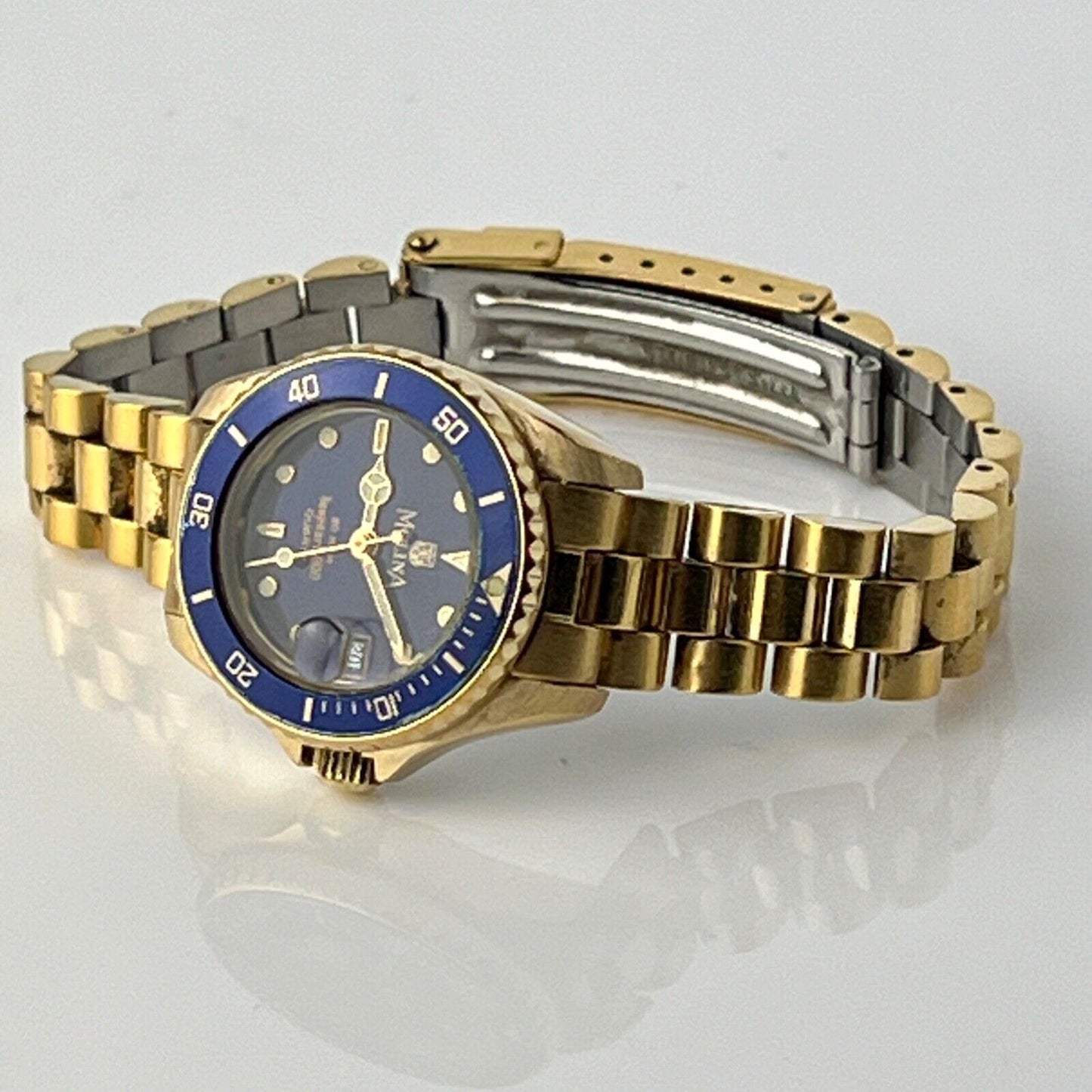 Molina Sea Pearl Date Watch Womens Swiss Made Blue Rotating Bezel Golden Bracele