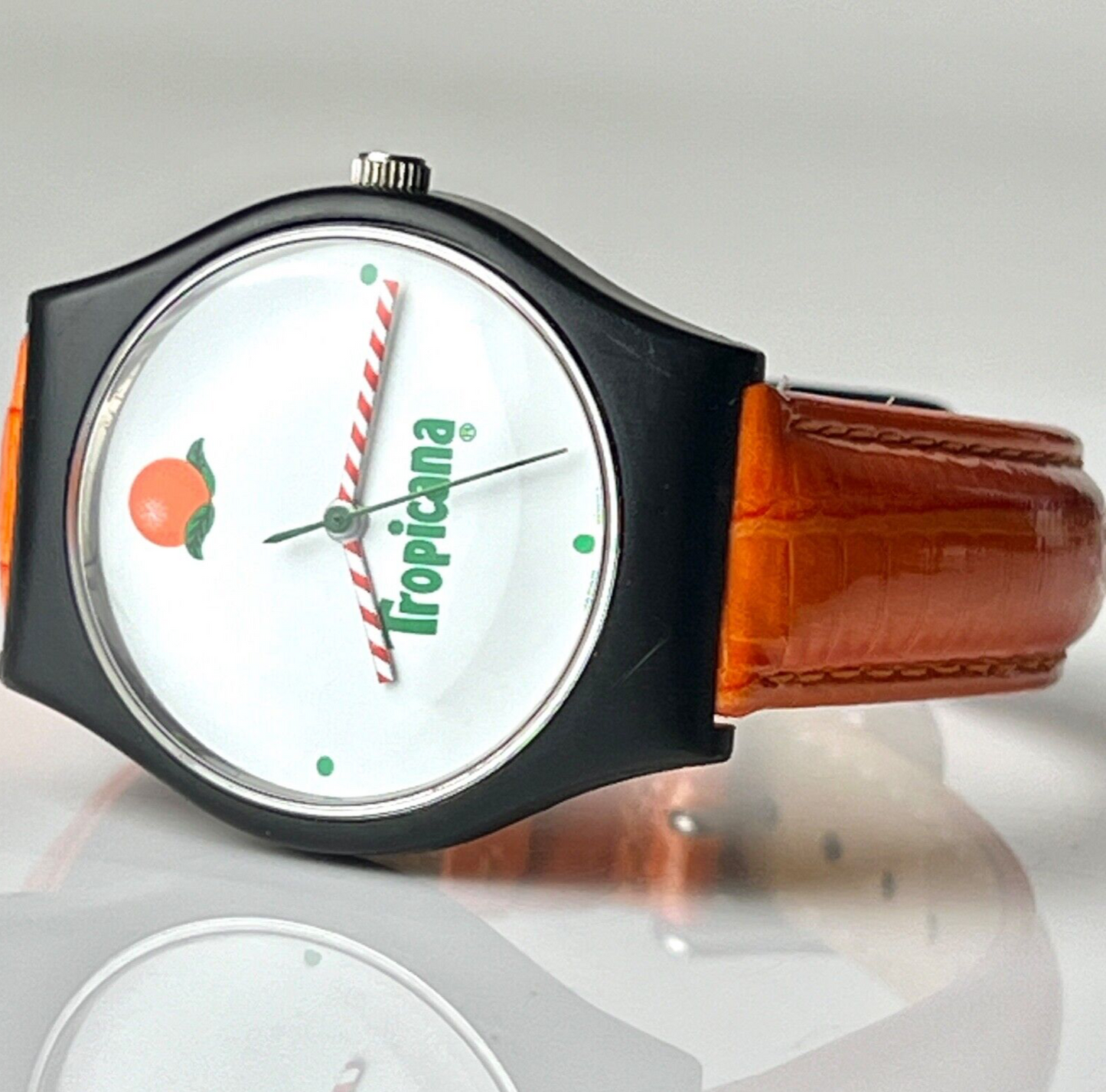 Invicta X Tropicana Vintage Watch The Juice is Loose Black 35mm Case Orange Leather Bands