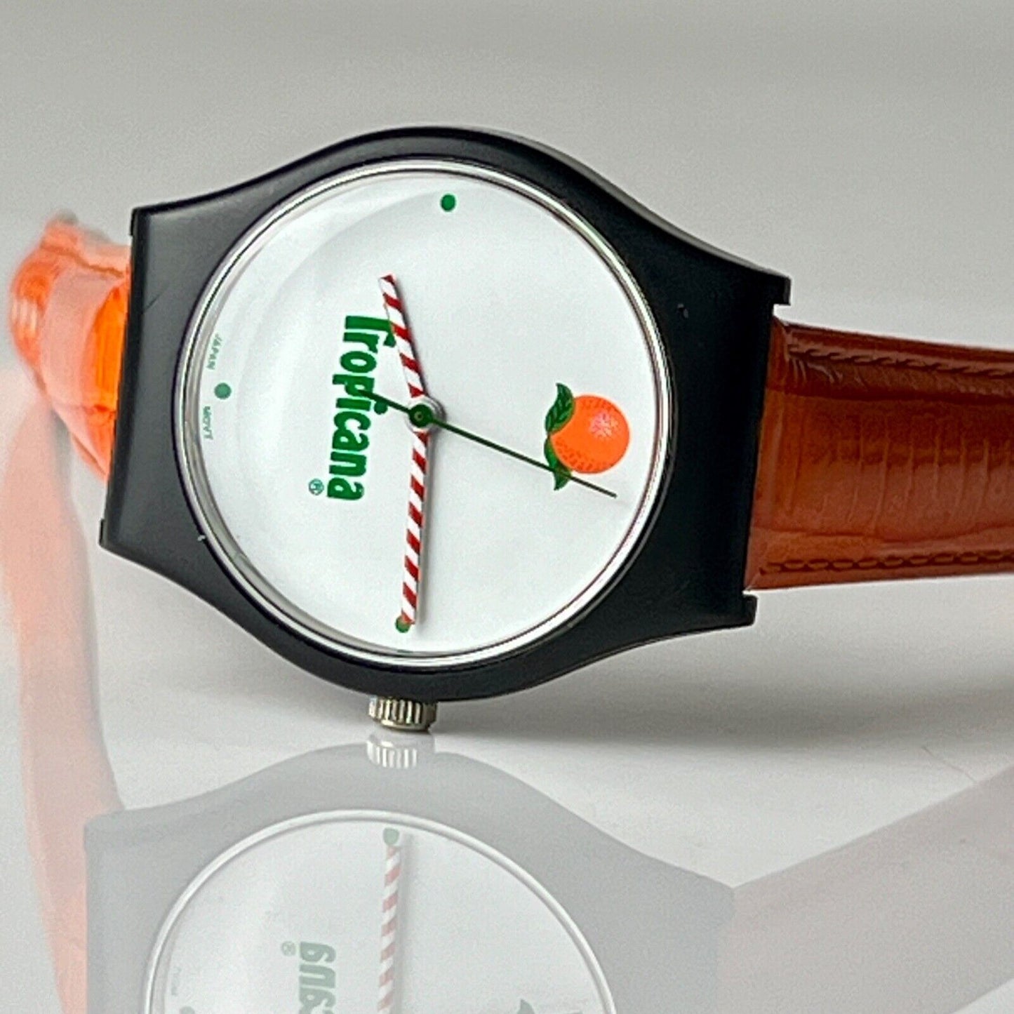 Invicta X Tropicana Vintage Watch The Juice is Loose Black 35mm Case Orange Leather Bands